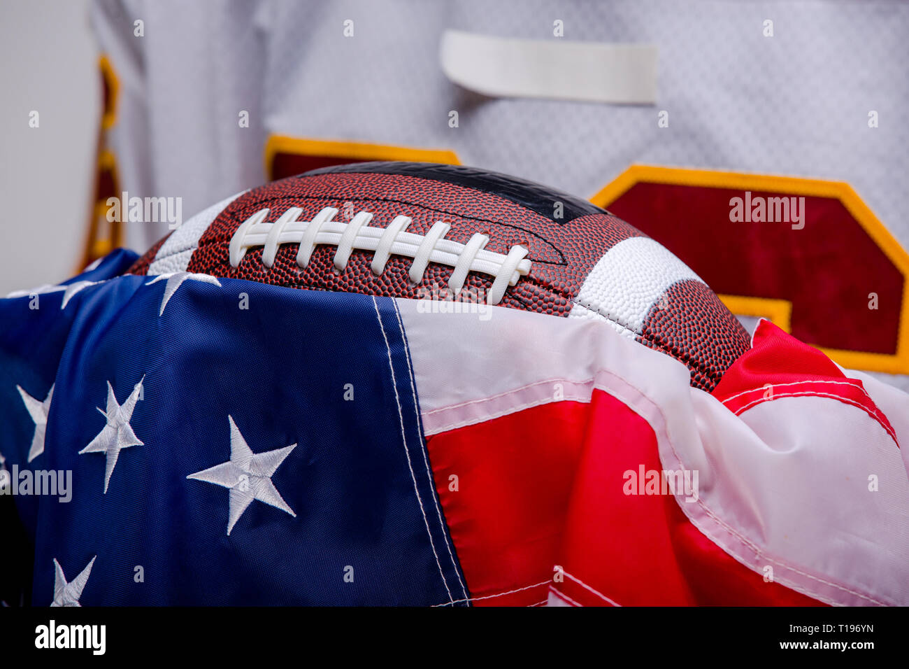 American football ball with national flag Stock Photo Alamy