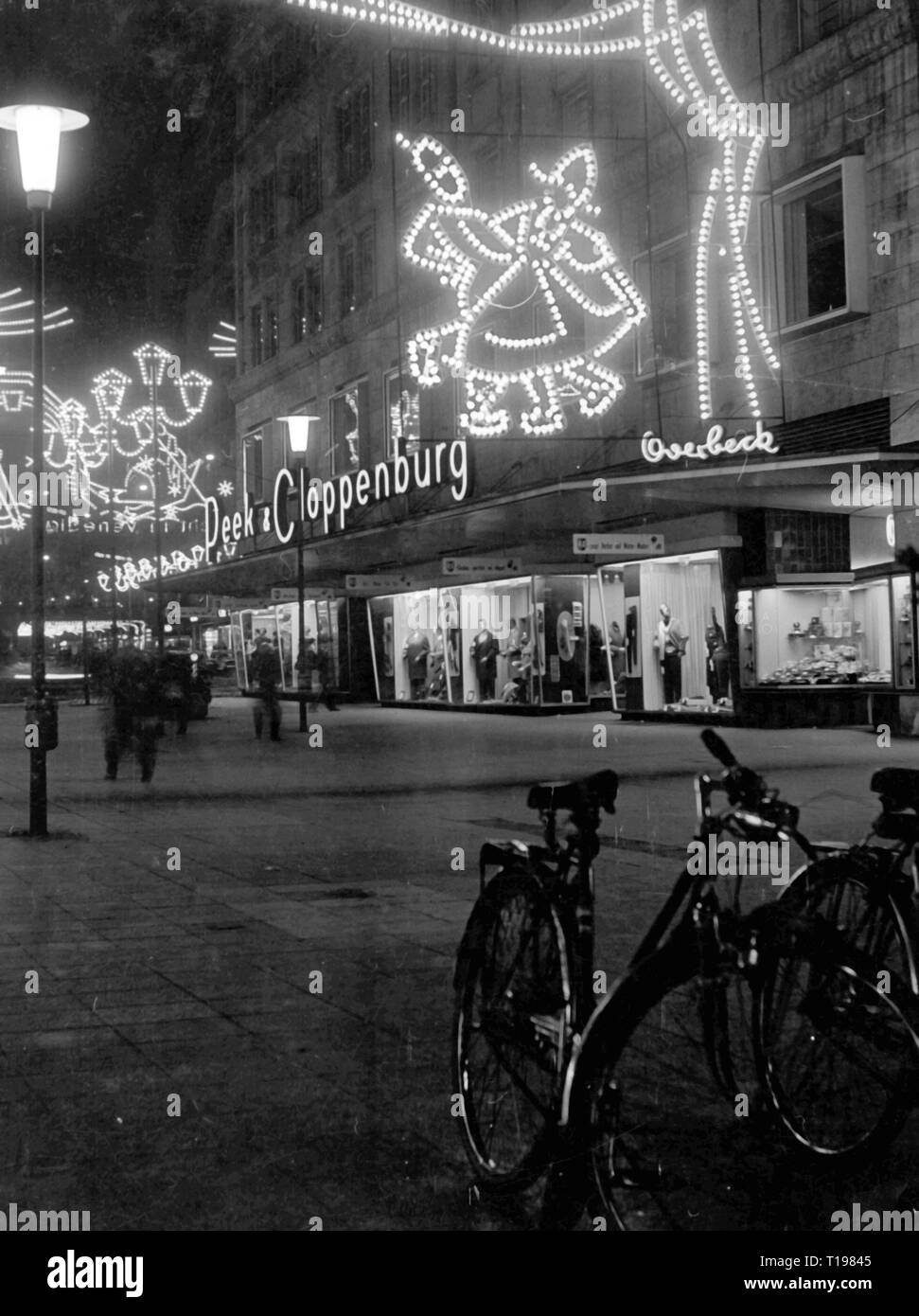 geography / travel historic, Germany, cities and communities, Essen, streets, Kettwiger street, with the clothes shop Peek and Cloppenburg, by night, during the Essen light weeks, December 1963, Additional-Rights-Clearance-Info-Not-Available Stock Photo