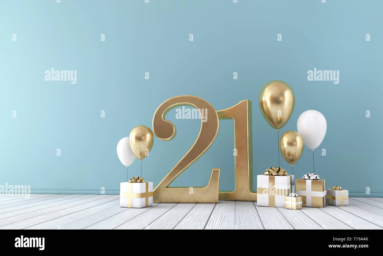 Number 21 party celebration room with gold and white balloons and gift boxes.  Stock Photo
