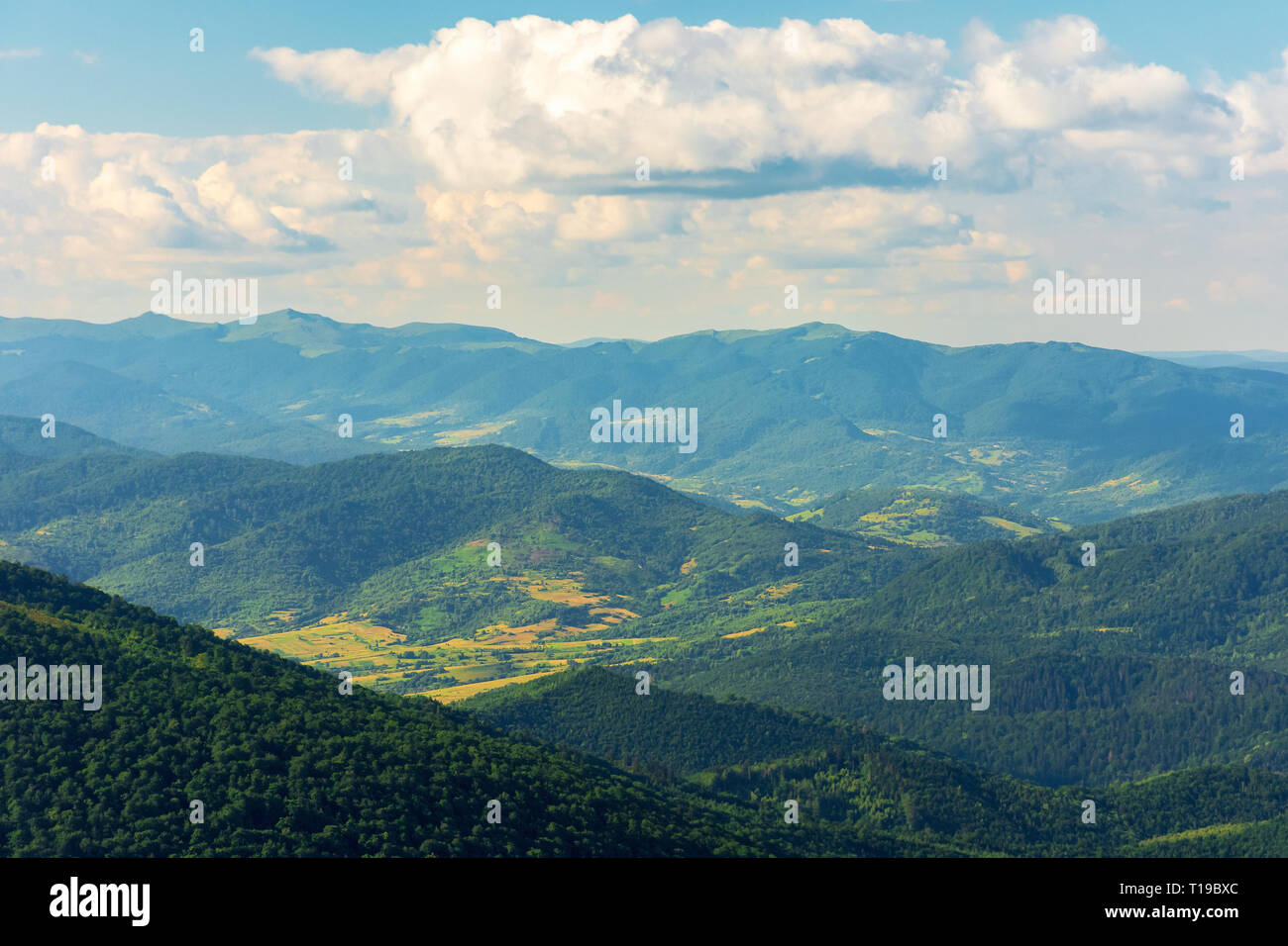 mountains, valleys and ridges of carpathians.  beautiful view of Beskid massif in summertime. Peaks of Bieszczady National Park in the distance. Stock Photo