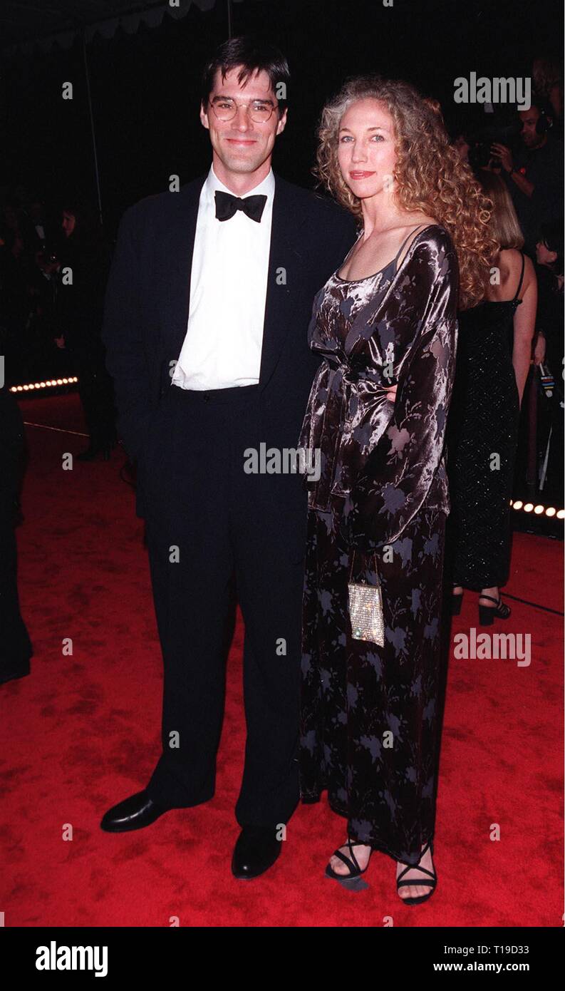 LOS ANGELES, CA - January 11, 1998: 'Dharma & Greg' star THOMAS GIBSON & wife at the People's Choice Awards, in Los Angeles, where his series won the Favorite New TV Comedy  series award. Stock Photo