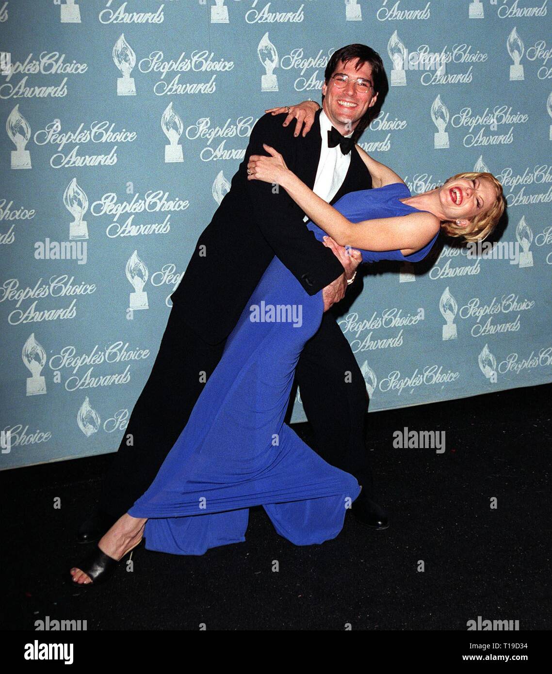 LOS ANGELES, CA - January 11, 1998: 'Dharma & Greg' stars THOMAS GIBSON & JENNA ELFMAN at the People's Choice Awards, in Los Angeles, where their series won the Favorite New TV Comedy  series award. Stock Photo