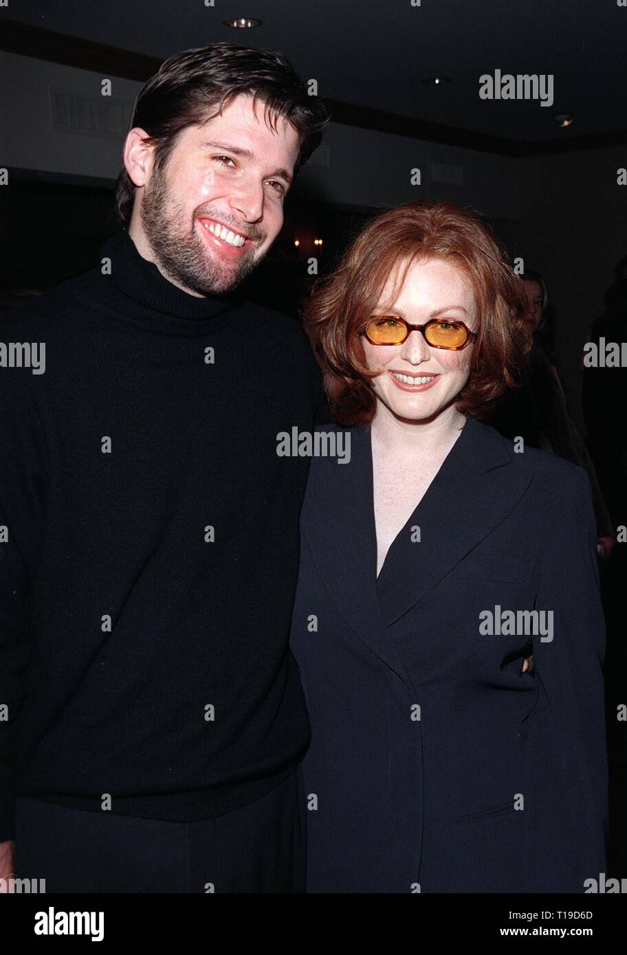 LOS ANGELES, CA - January 13, 1998: Actress JUIANNE MOORE & husband at the L.A. Film Critics Assoc. Awards where she won the Best Supporting Actress award for 'Boogie Nights.' Stock Photo