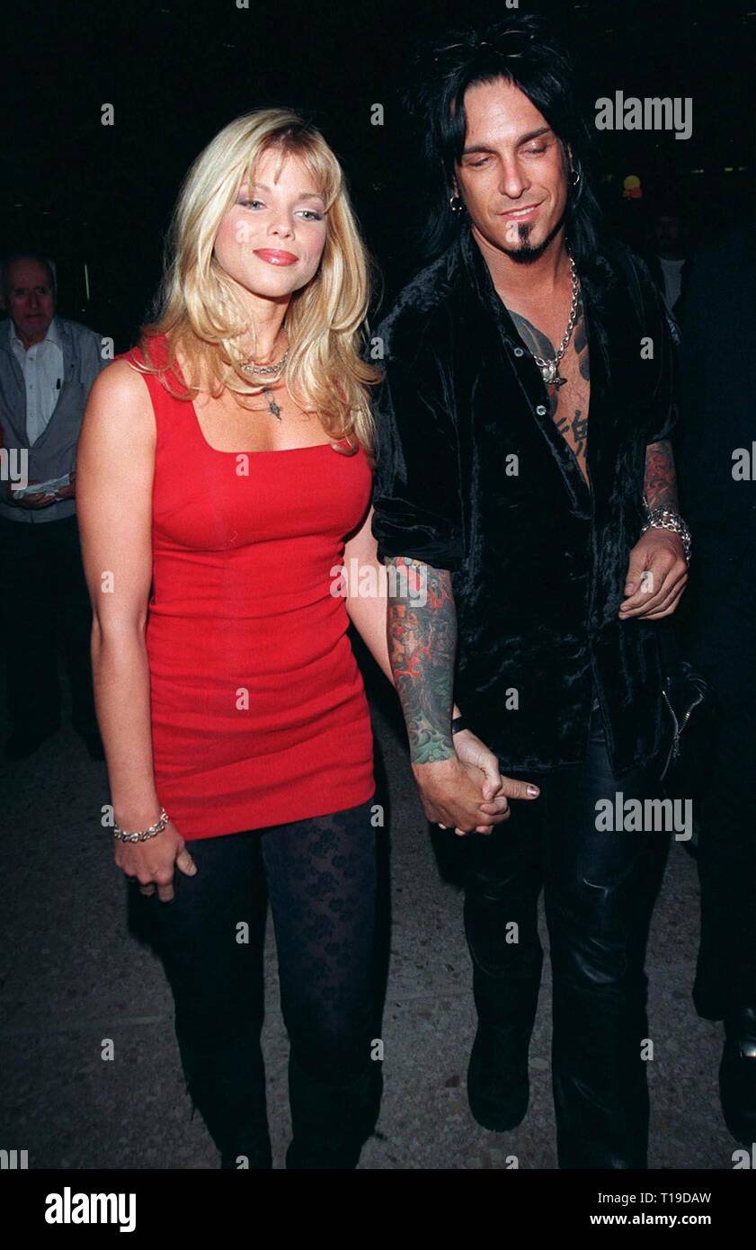 LOS ANGELES, CA - January 20, 1998: Baywatch star DONNA D'ERRICO & husband NICKY SIXX at the world premiere of 'Great Expectations,' in Century City Los Angeles. Stock Photo