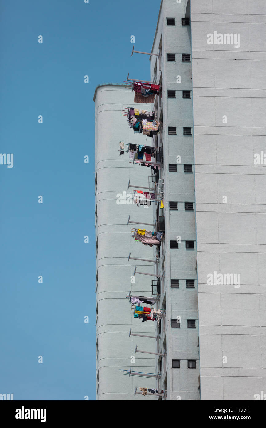 Hi-rise building in Singapore with washing hanging out Stock Photo