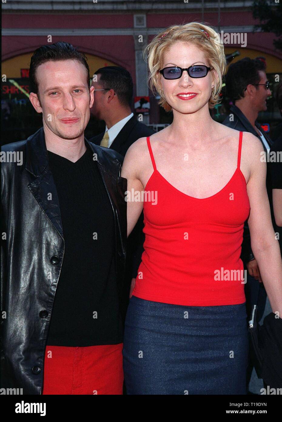 LOS ANGELES, CA - March 15, 1998: 'Dharma & Greg' star JENNA ELFMAN & husband Bodhi Elfman at 20th anniversary re-premiere of 'Grease' at Mann's Chinese Theatre, Hollywood. Stock Photo