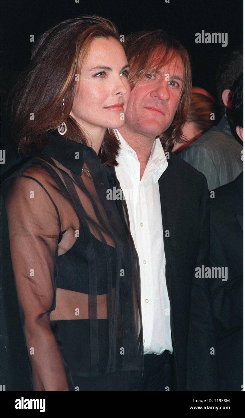 CANNES, FRANCE - May 16, 1998:  French actor GERARD DEPARDIEU & actress CAROLE BOUQUET at premiere of 'Fear & Loathing in Las Vegas' at the Cannes Film Festival. Stock Photo