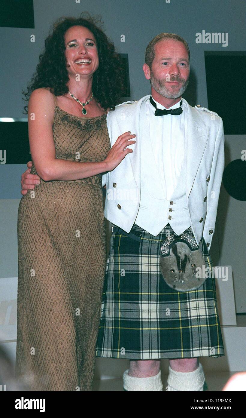 CANNES, FRANCE - May 24, 1998:  Actor PETER MULLAN with actress ANDIE McDOWELL at the Cannes Film Festival awards ceremony where he won the Best Actor award. Stock Photo