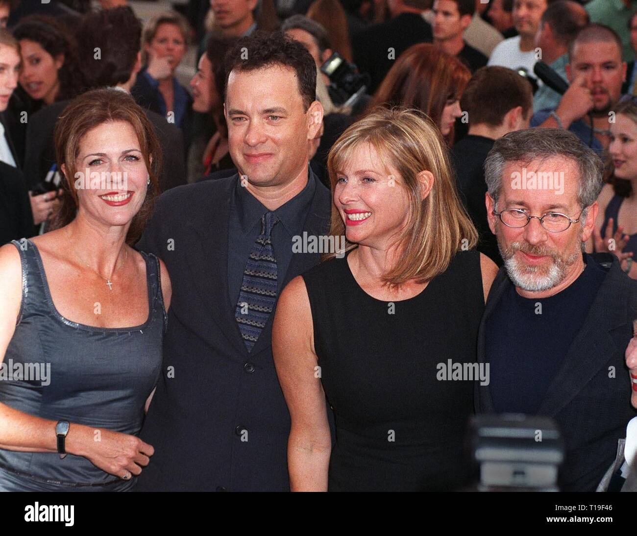 LOS ANGELES, CA - July 21, 1998:  Director STEVEN SPIELBERG (right) & wife KATE CAPSHAW with actor TOM HANKS & actress wife RITA WILSON at the world premiere of their new movie, 'Saving Private Ryan,' in Los Angeles. Stock Photo