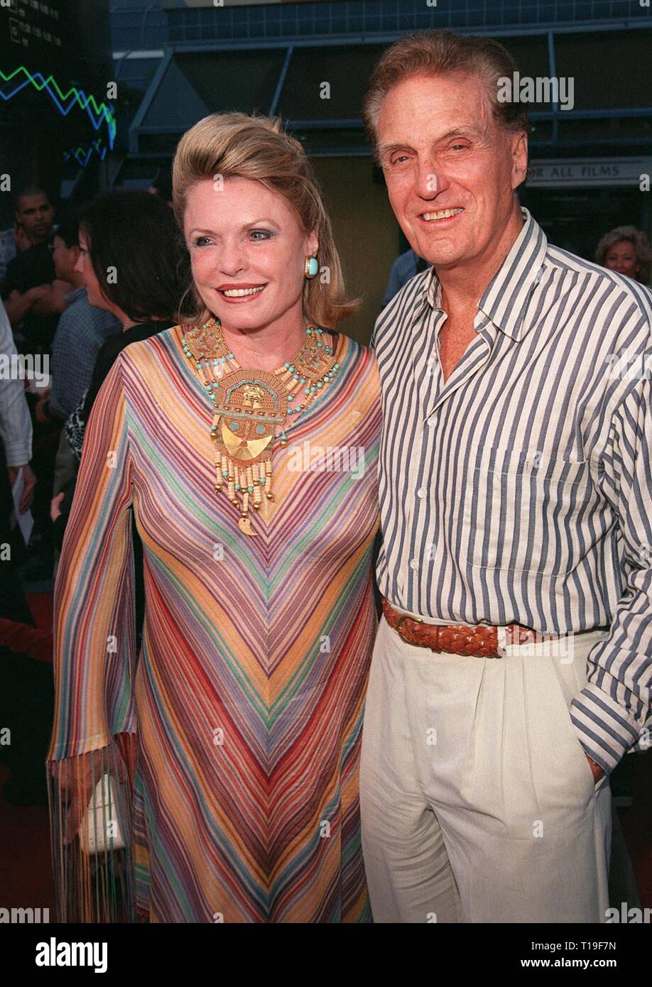 LOS ANGELES, CA - July 29, 1998:  Actor ROBERT STACK & wife ROSEMARY at the premiere of 'BASEketball' at Universal Studios. He stars in the movie with Jenny McCarthy, Yasmine Bleeth, Trey Parker & Matt Stone. Stock Photo