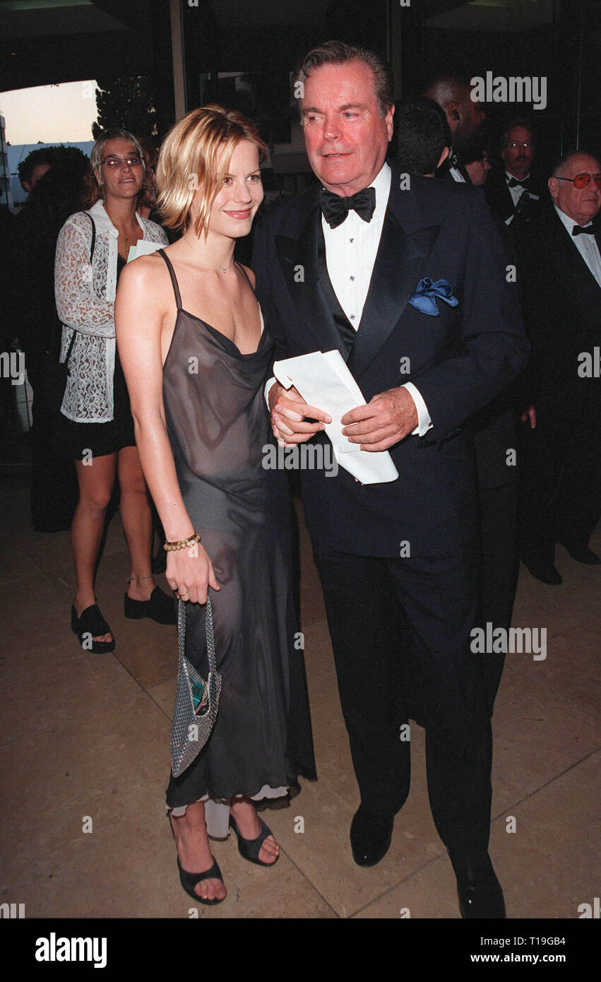 LOS ANGELES, CA - October 11, 1998: Actor ROBERT WAGNER & daughter Courtney Brooke Wagner at the International Achievement in Arts Awards in Beverly Hills. The event, which was hosted by Wagner, benefitted the Whitney Houston Foundation for Children. Stock Photo