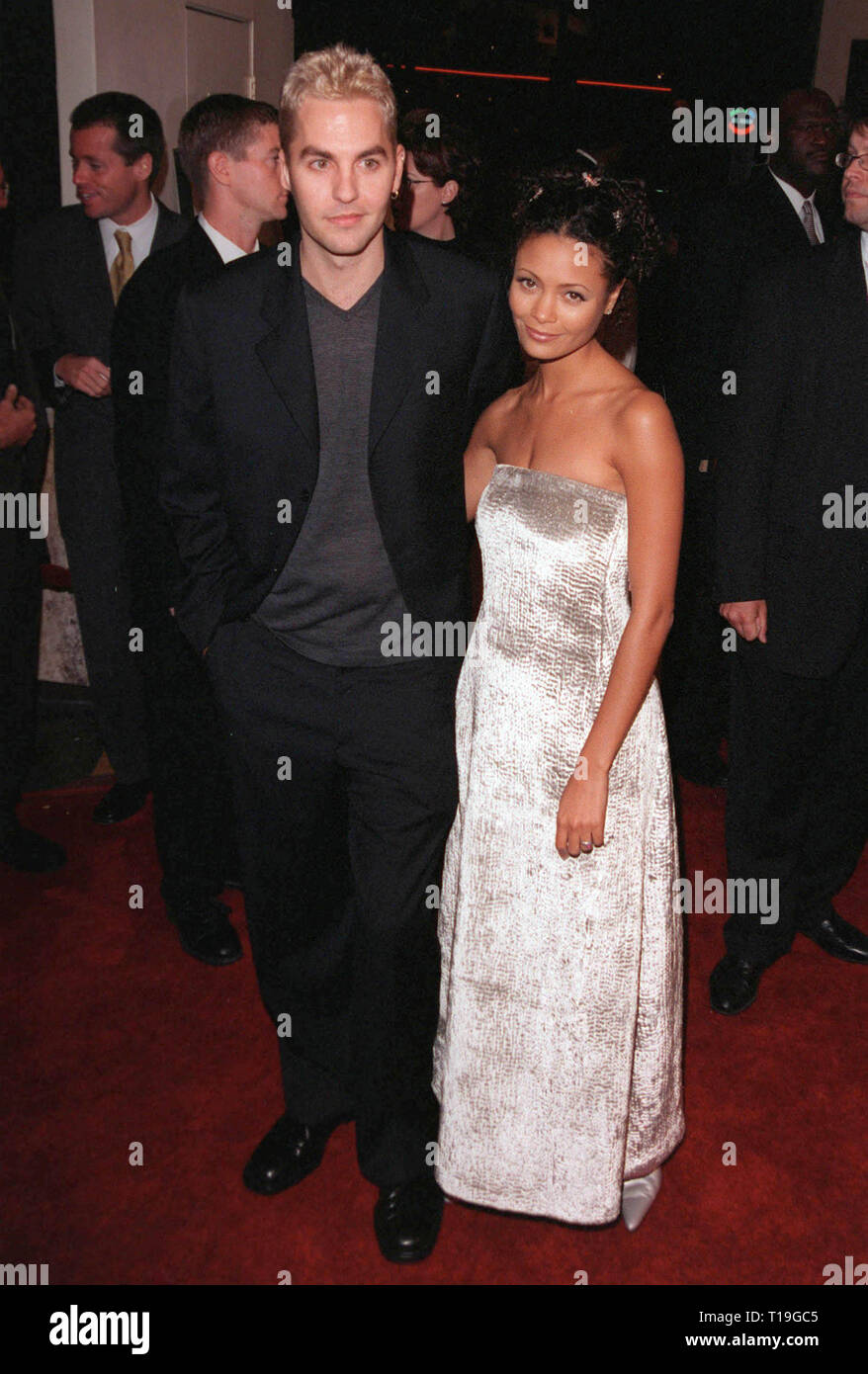 LOS ANGELES, CA - October 12, 1998: British actress THANDIE NEWTON & husband Ol Parker at the Los Angeles premiere of her new movie 'Beloved' in which she stars with Oprah Winfrey. Stock Photo
