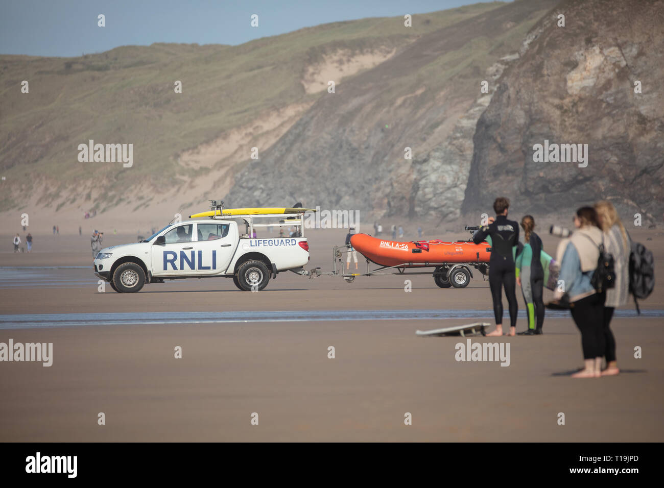 Perranporth Lifeguards watching over the surfers and swimmers on the fantastic Perranporth beach. Stock Photo