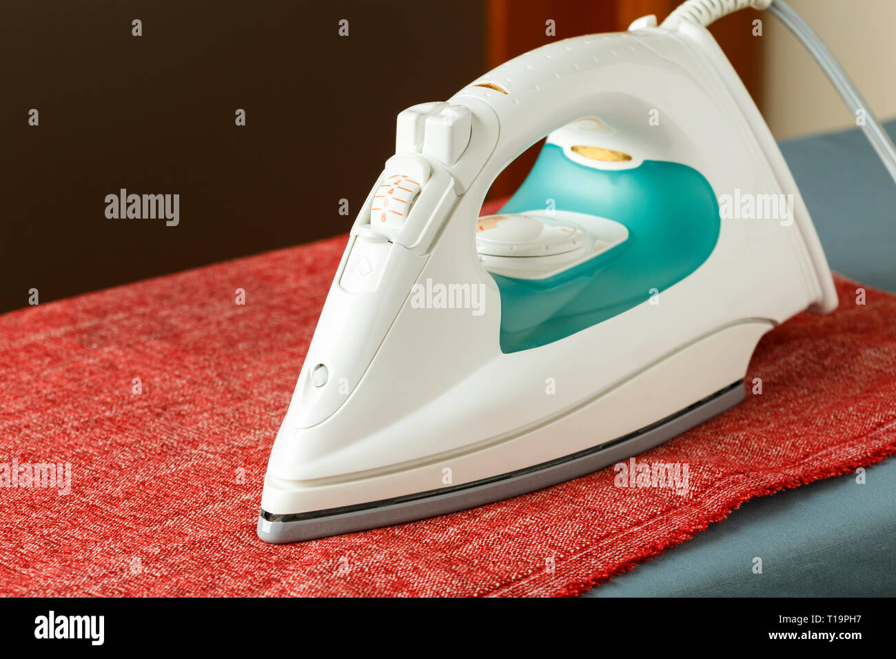 Steam ironing press machine hi-res stock photography and images - Alamy