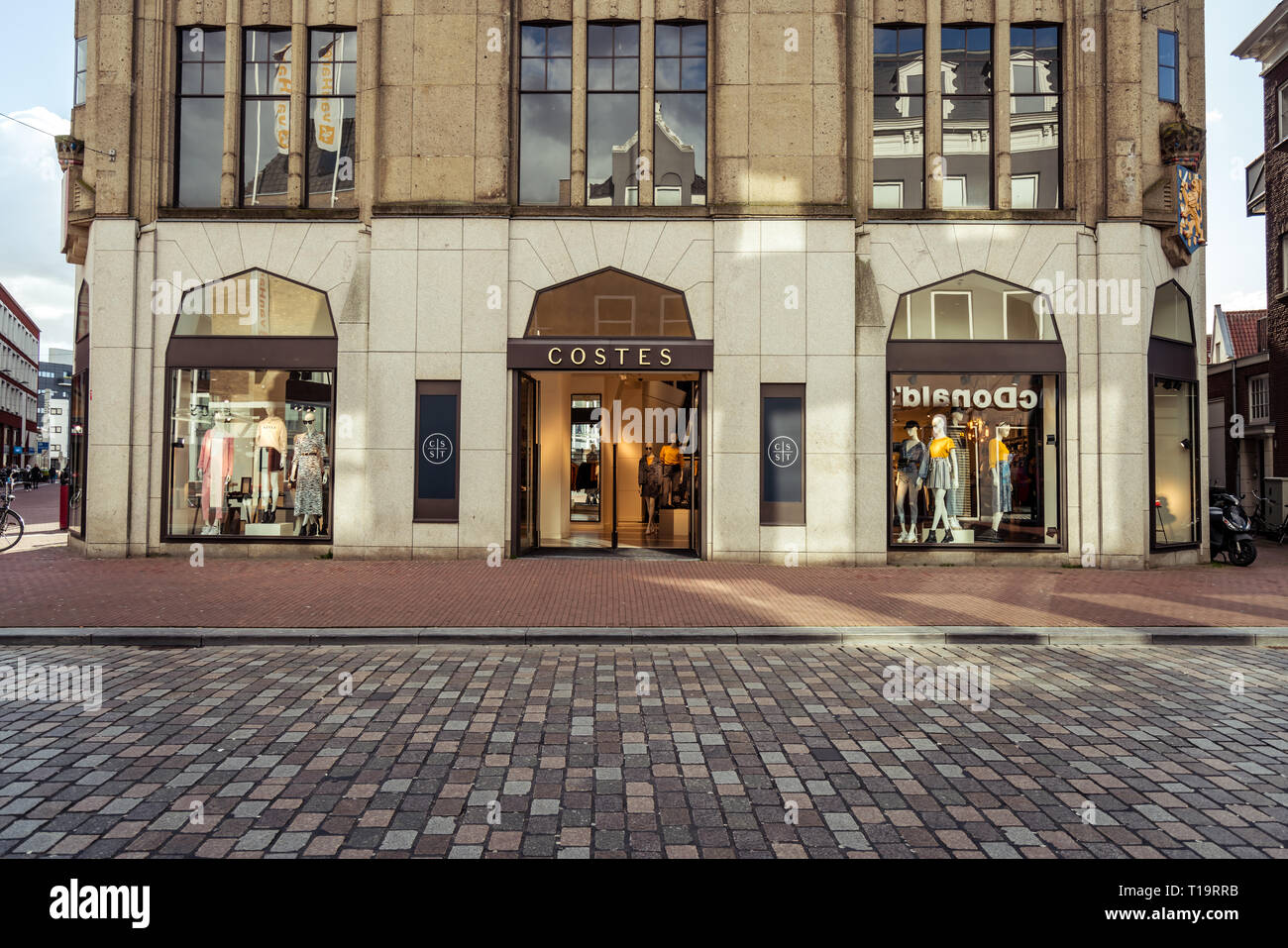 Dordrecht, Netherlands - March 03, 2019: Costes logo on a storefront.  Costes, part of The Sting Companies, is originally a Dutch chain of  clothing sto Stock Photo - Alamy