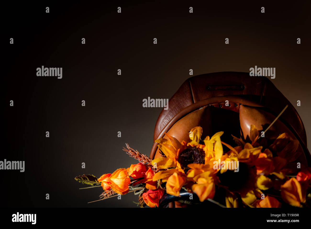 Thanksgiving english saddle with autumn flowers and no people classically lit Stock Photo