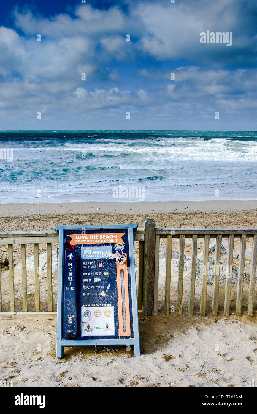 A sign encouraging people to pick up litter on Fistral Beach in Newquay in Cornwall. Stock Photo