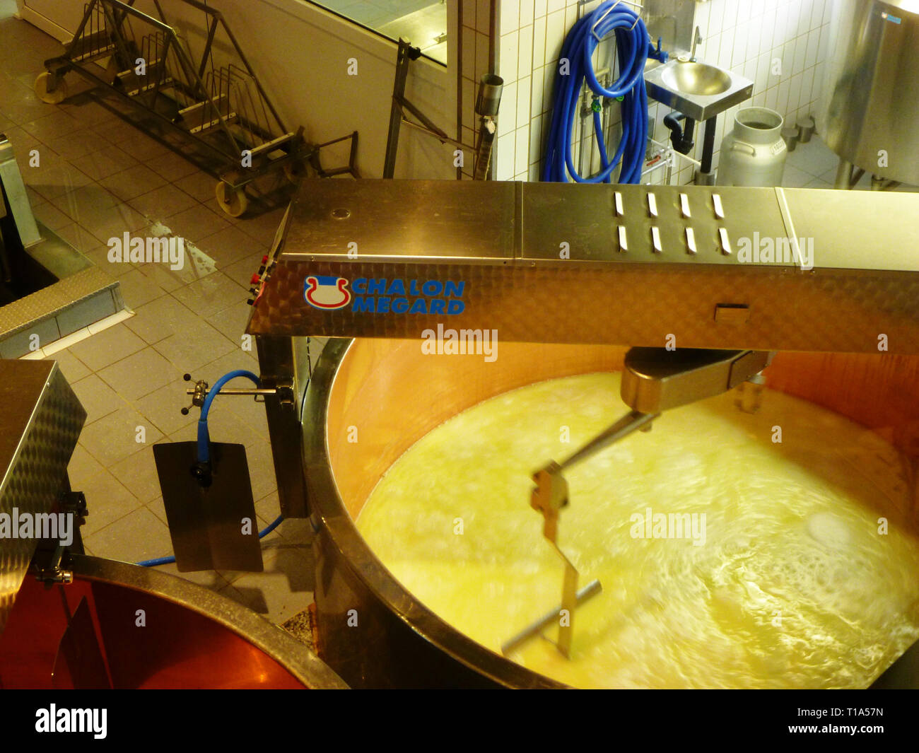 Gruyere, Swiss, 2012 -La maison du Gruyere - cooper tank with cheese in fabrication Stock Photo