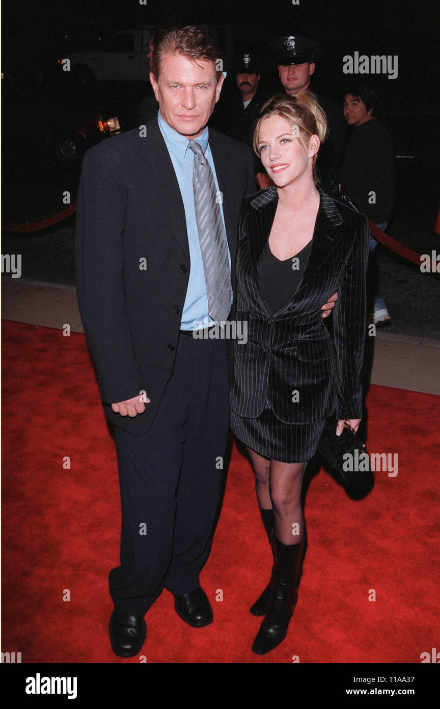 LOS ANGELES, CA - November 2, 1998: Actor TOM BERENGER & wife at the 15th anniversary Hollywood re-premiere of his movie 'The Big Chill.' Stock Photo