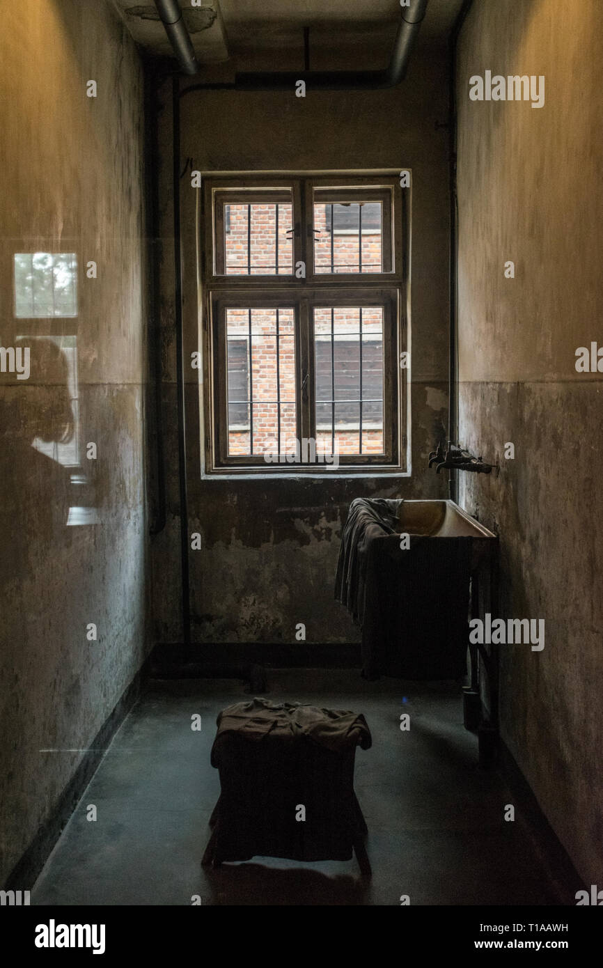 Oswiencim, Poland - September 21, 2019: Sleeping quarters with wooden bunk beds where the prisoners spend the days waiting for a trial at The Nazi Stock Photo