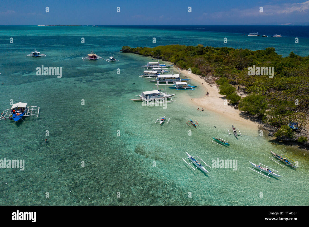 Sulpa Islet located off Mactan Island in the Province of Cebu is a popular destination for Island Hopping for both locals & International travellers.I Stock Photo