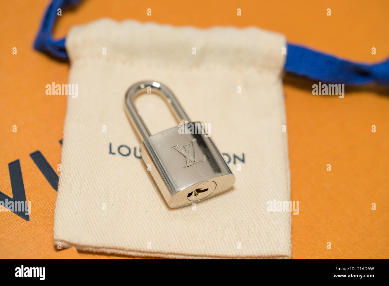 Lawrence Township Jersey, March 1, Vuitton Lock & Key Brass Keepall Alma Padlock Charm Gold closeup Stock Photo - Alamy
