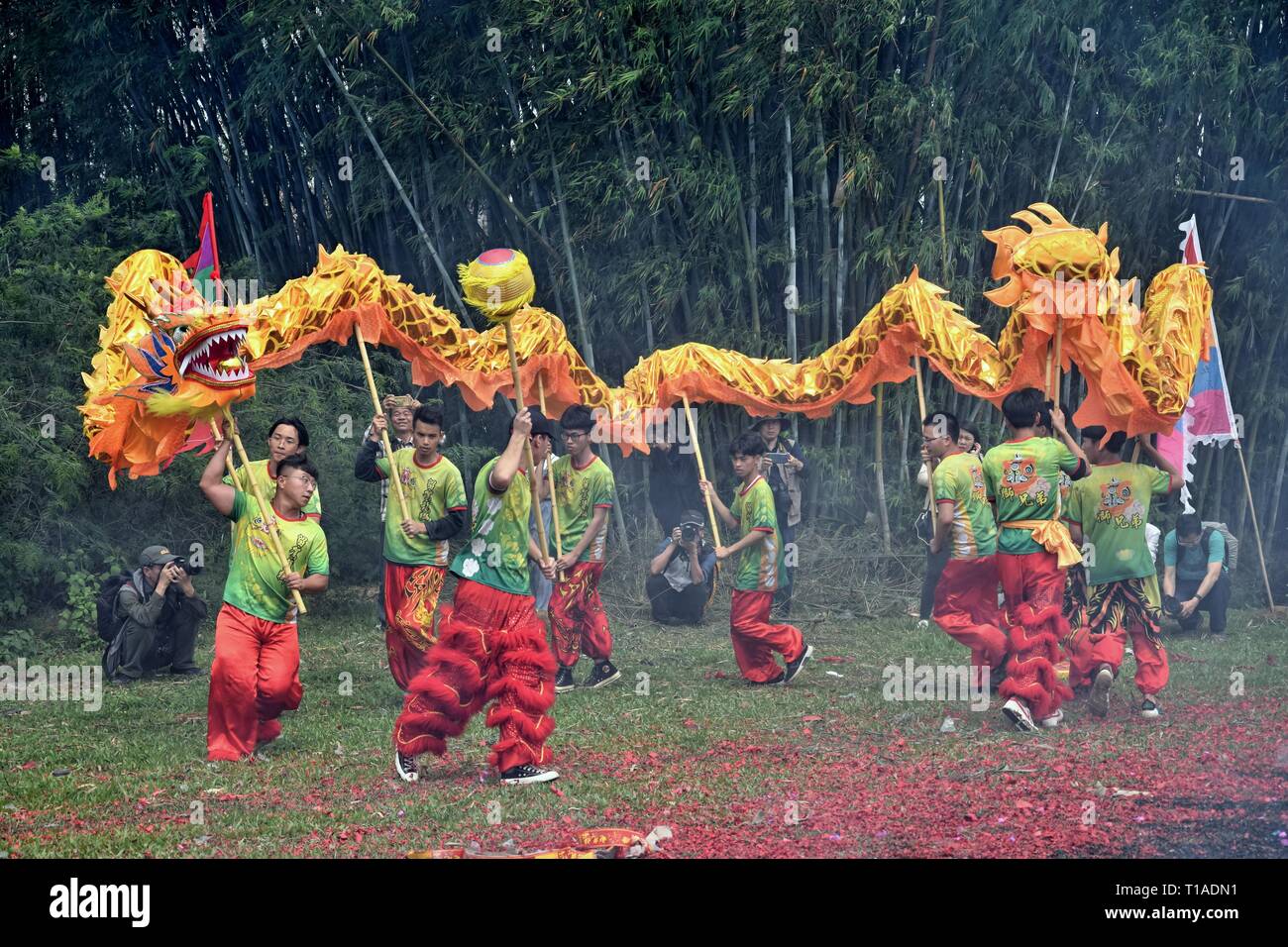 GAOZHOU, CHINA – CIRCA MARCH 2019: Dragon dance is a form of traditional dance in Chinese culture. It symbolizes the imagined movements of the river. Stock Photo