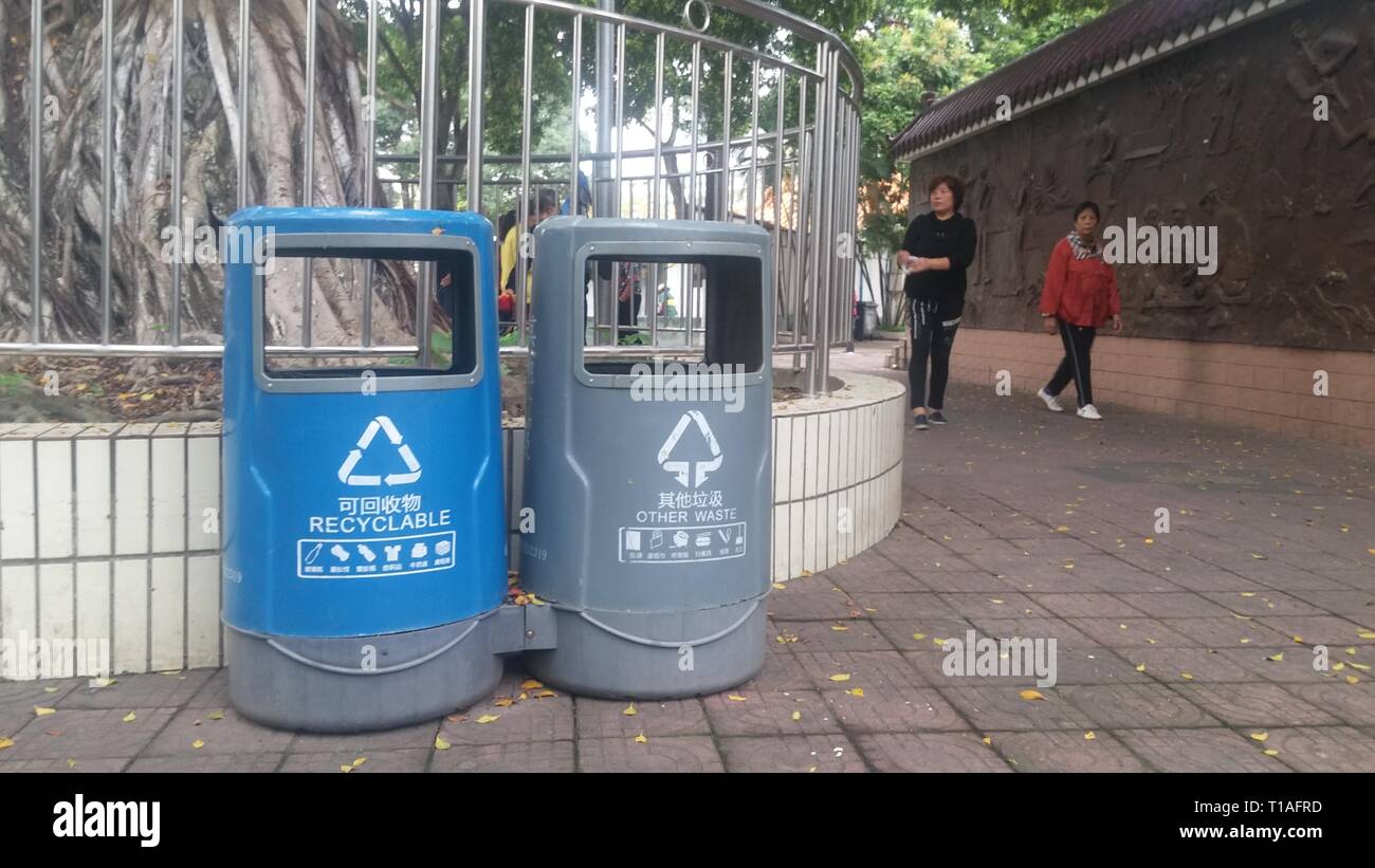 Garbage sorting bins are placed in streets or parks to facilitate