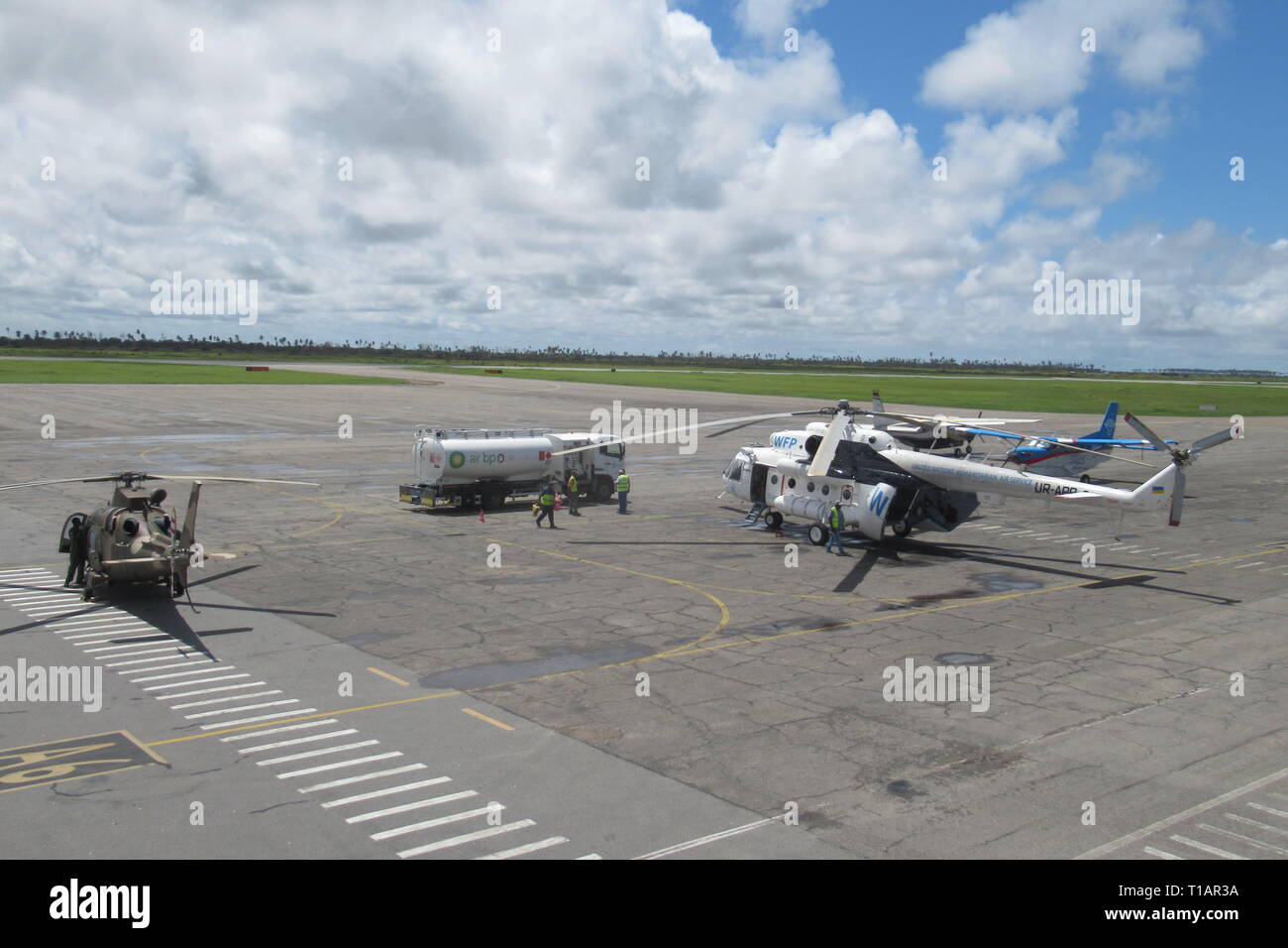 Beira, Mozambique. 21st Mar, 2019. Rescue helicopters are standing at Beira airport. (to dpa 'Helpers in Mozambique warn against diseases after cyclone' from 25.03.2019) Credit: Kate Bartlett/dpa/Alamy Live News Stock Photo