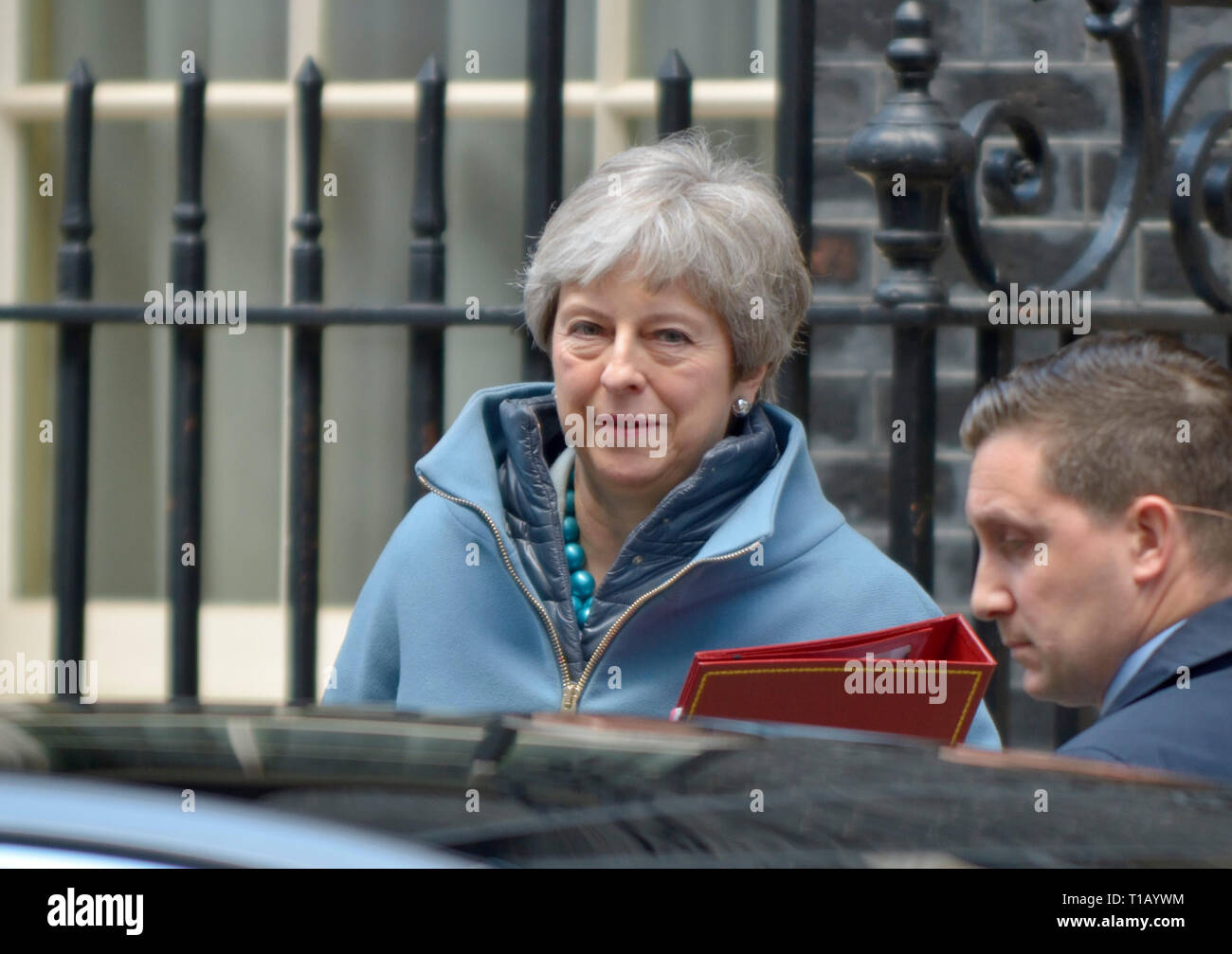 London, UK. 25th March. Ministers leave a Monday morning cabinet meeting in Number Ten before an important day of Brexit votes in Parliament. Theresa May gets into her car Credit: PjrFoto/Alamy Live News Stock Photo