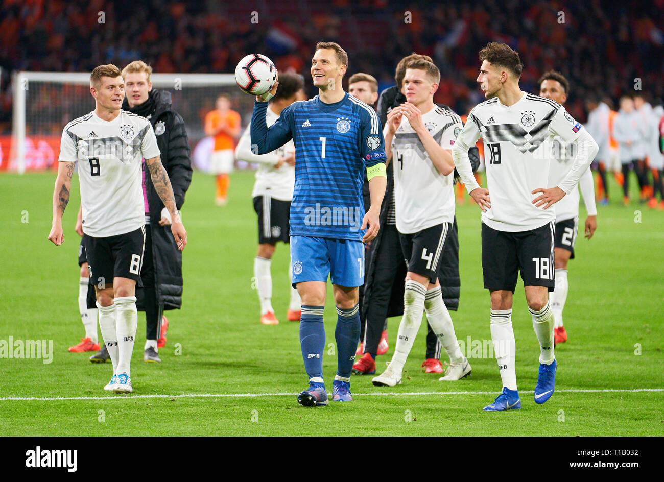 Amsterdam, Netherlands. 24th Mar, 2019. Celebration after the match: Manuel NEUER, DFB 1 goalkeeper, Matthias GINTER, DFB 4 Leon GORETZKA, DFB 18 Toni KROOS, DFB 8 NETHERLANDS - GERMANY 2-3 Important: DFB regulations prohibit any use of photographs as image sequences and/or quasi-video. Qualification for European Championships, EM Quali, 2020 Season 2018/2019, March 24, 2019 in Amsterdam, Netherlands. Credit: Peter Schatz/Alamy Live News Stock Photo