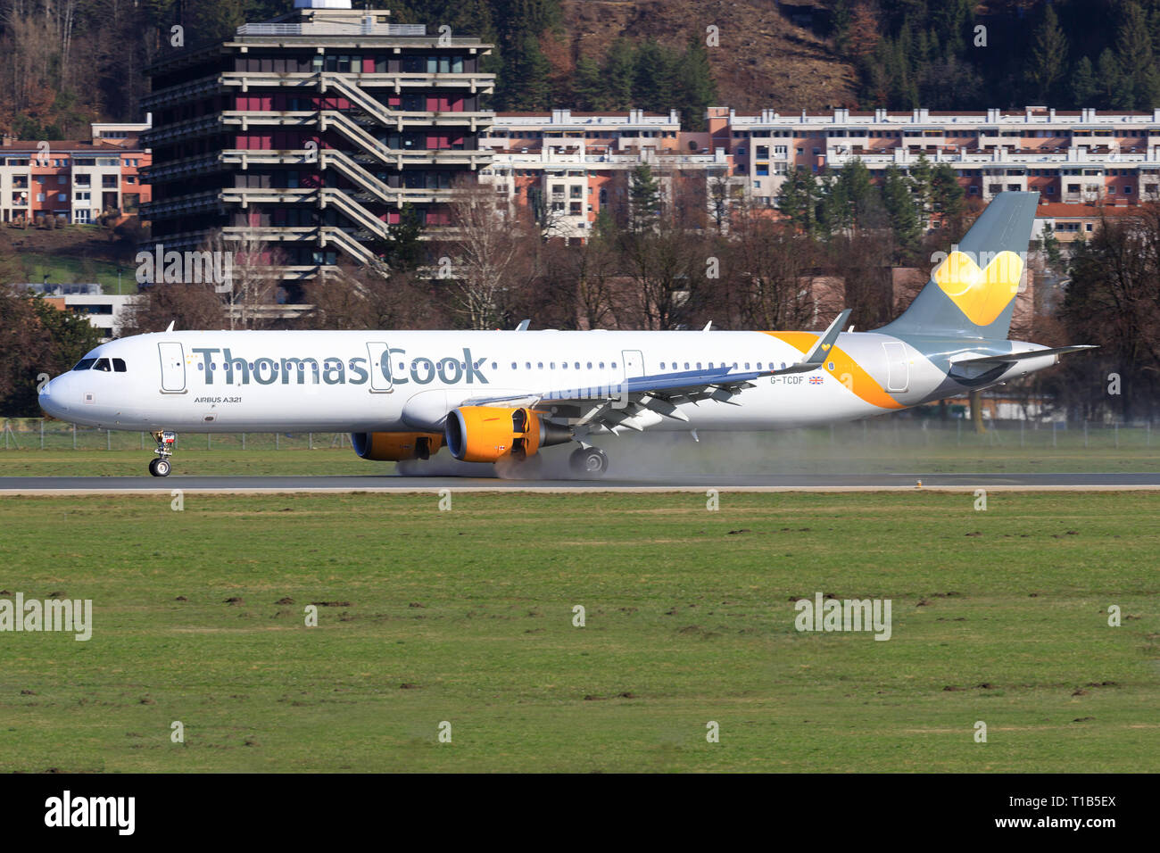 Austria January 4, 2015: Boeing 757 from Thomas Cook landing at Innsbruck Airport Stock Photo