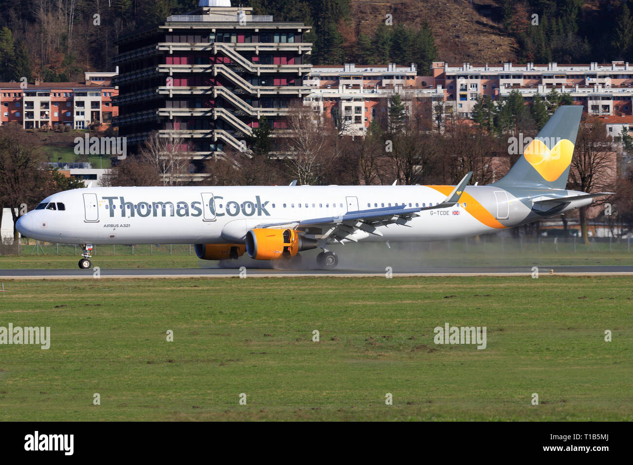 Austria January 4, 2015: Boeing 757 from Thomas Cook landing at Innsbruck Airport Stock Photo