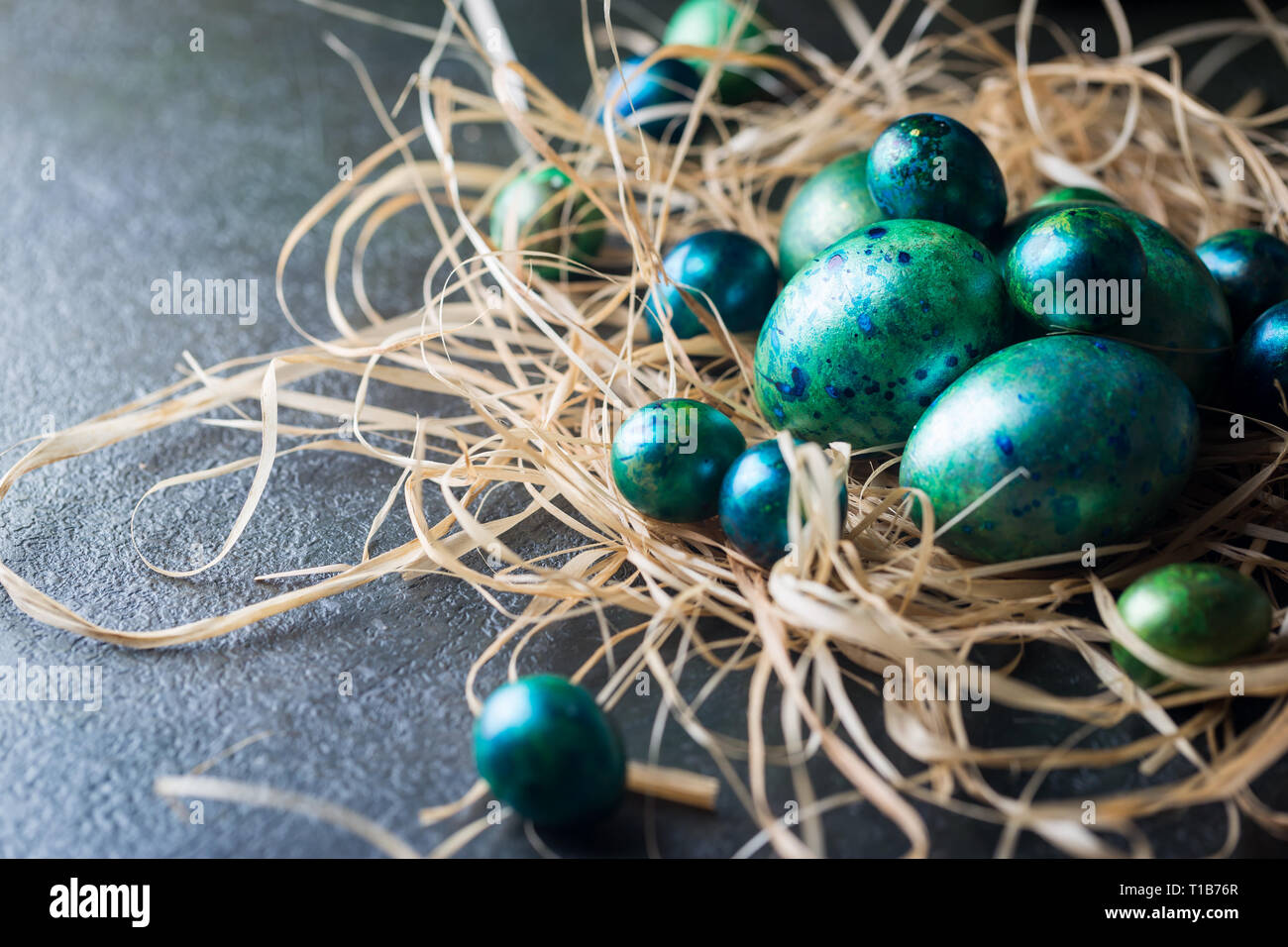 Easter background with painted Easter eggs in vintage style over dark background Stock Photo