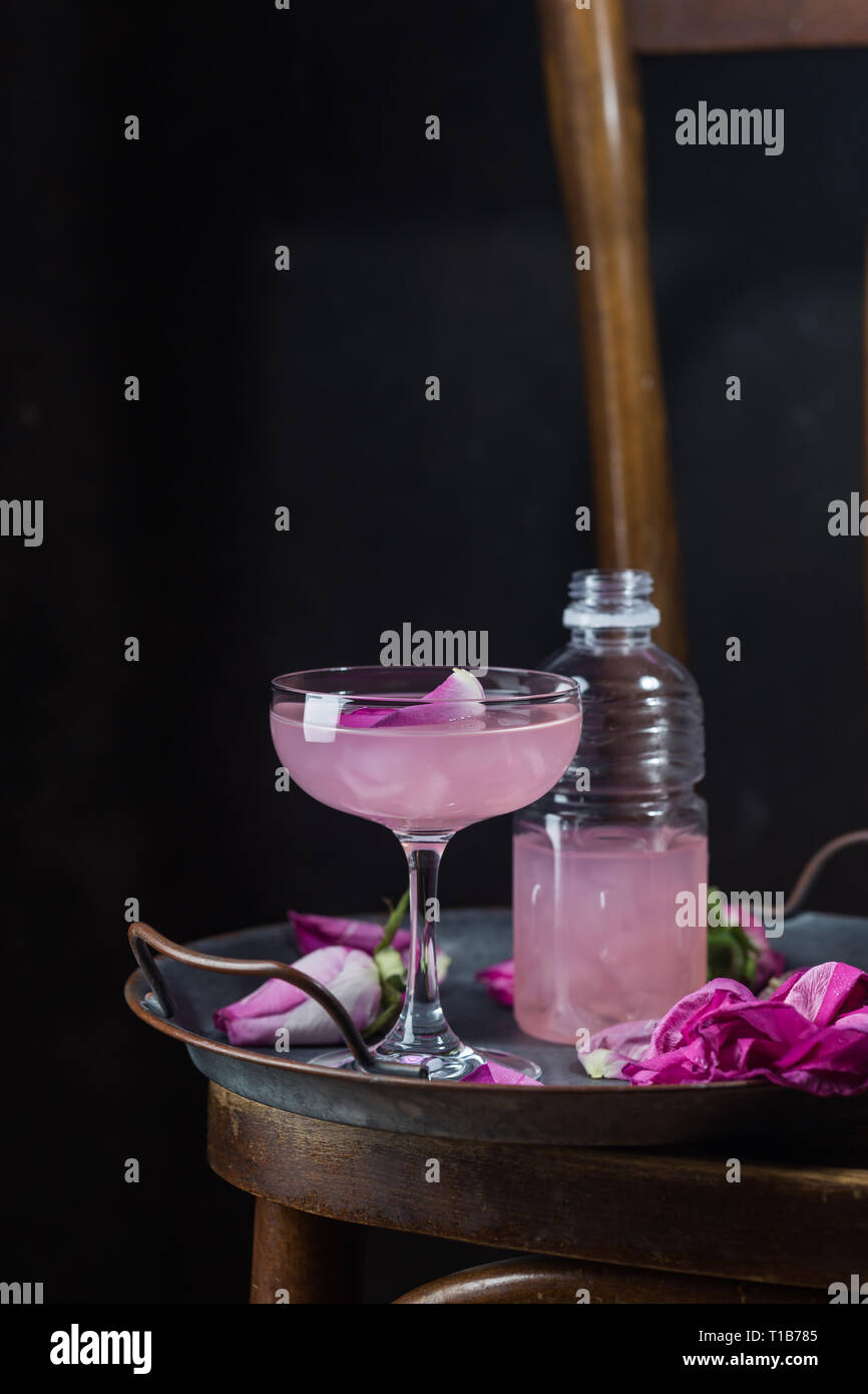 Summer Refreshment Drinks Light Pink Rose Cocktail With Rose Wine On Dark Background With