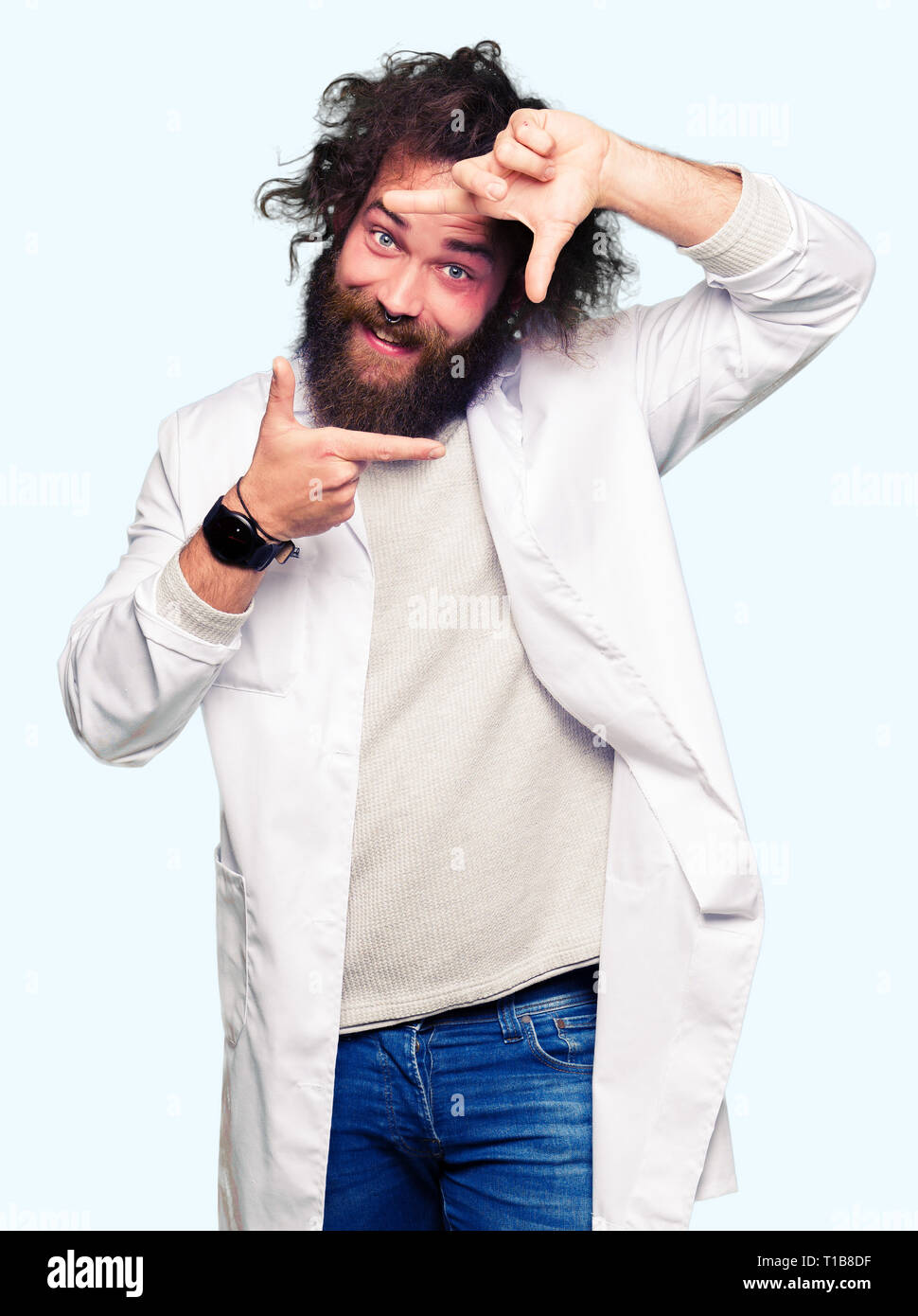 Crazy scientist with funny long hair smiling making frame with hands and  fingers with happy face. Creativity and photography concept Stock Photo -  Alamy
