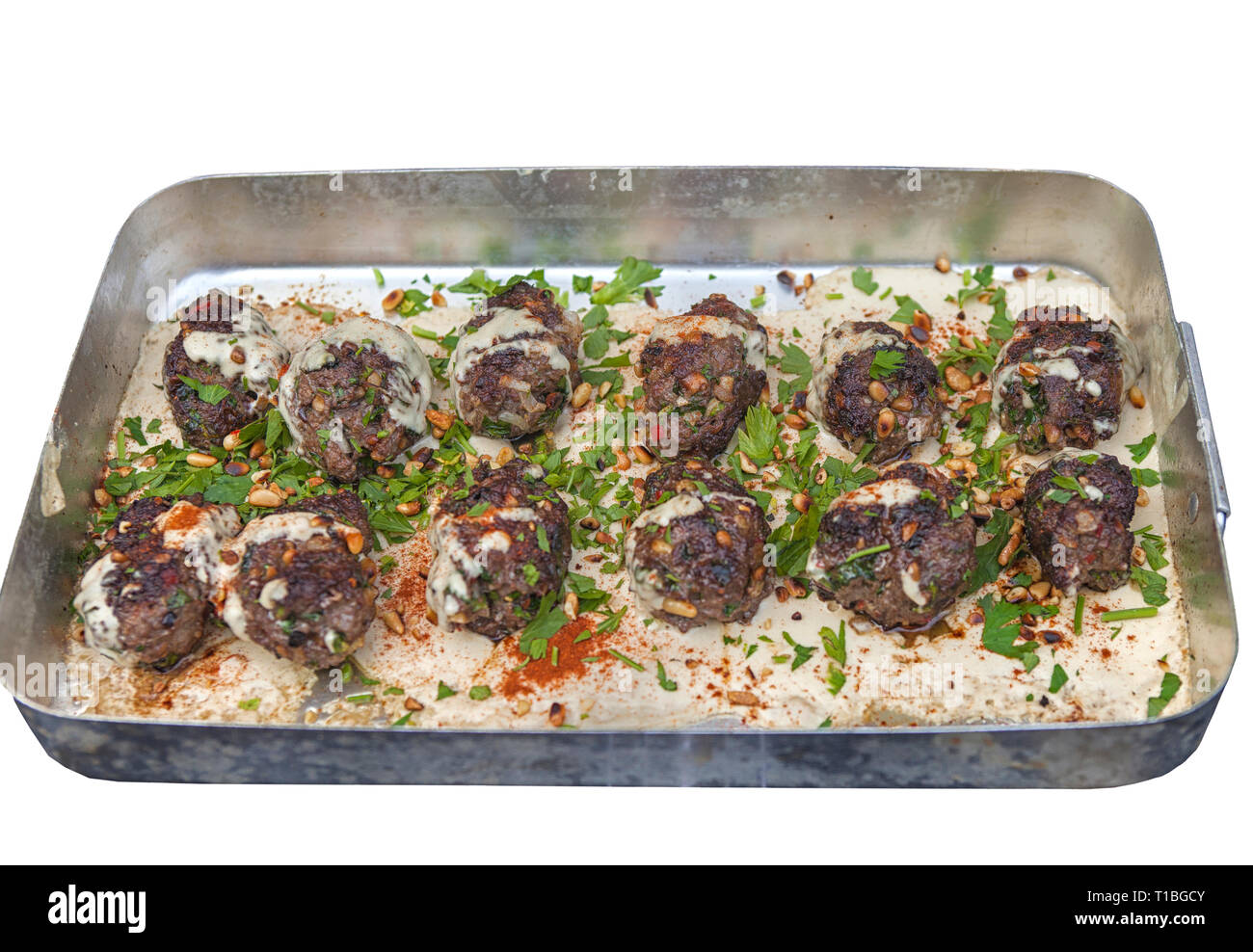 Spicy meatballs of lamb with sesame paste parsley and pinenuts Stock Photo