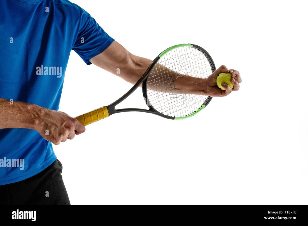 Stressed tennis player throwing and breaking a racket in anger and rage