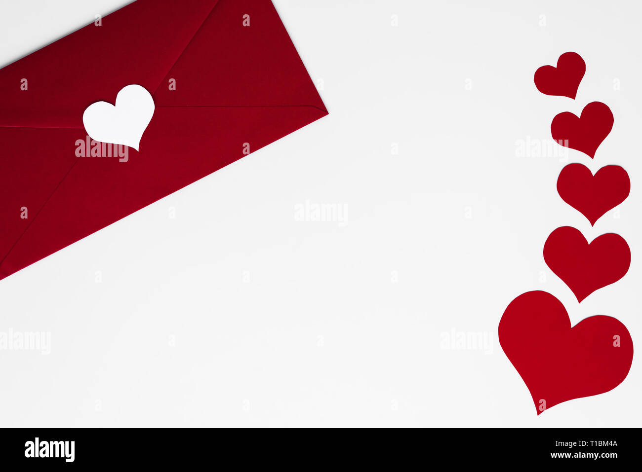 Concept of love letter in red envelope with white heart on. Romantic ...