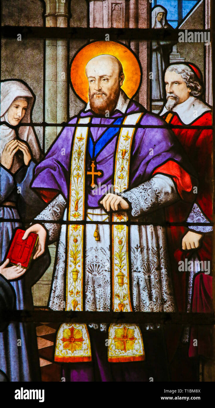 Stained Glass in the Church of Saint Severin, Latin Quarter, Paris, France, depicting Saint Francois de Sales, bishop of Geneva. Stock Photo