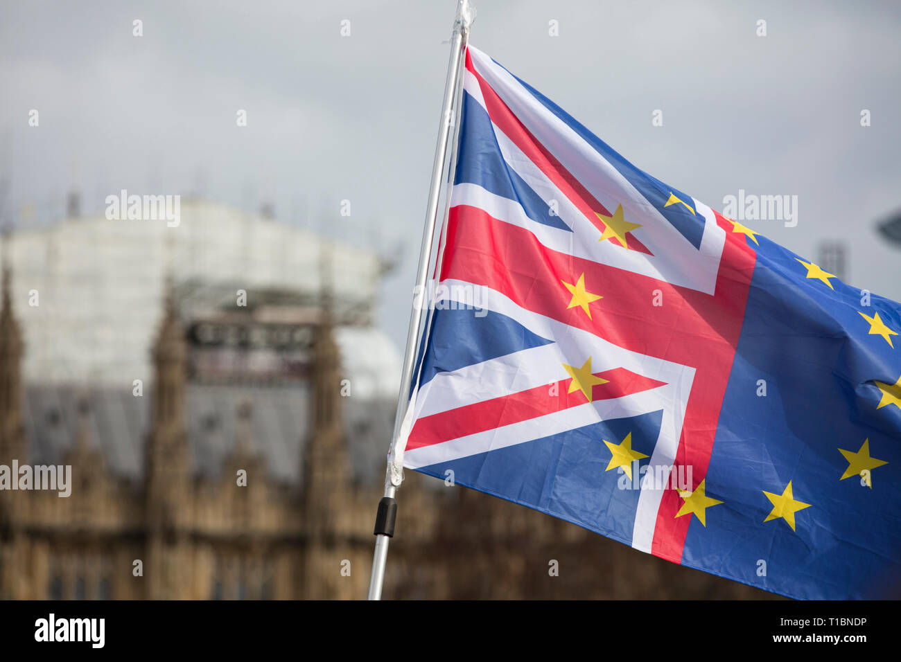 European Union and British flags fly together at an anti-Brexit political march Stock Photo