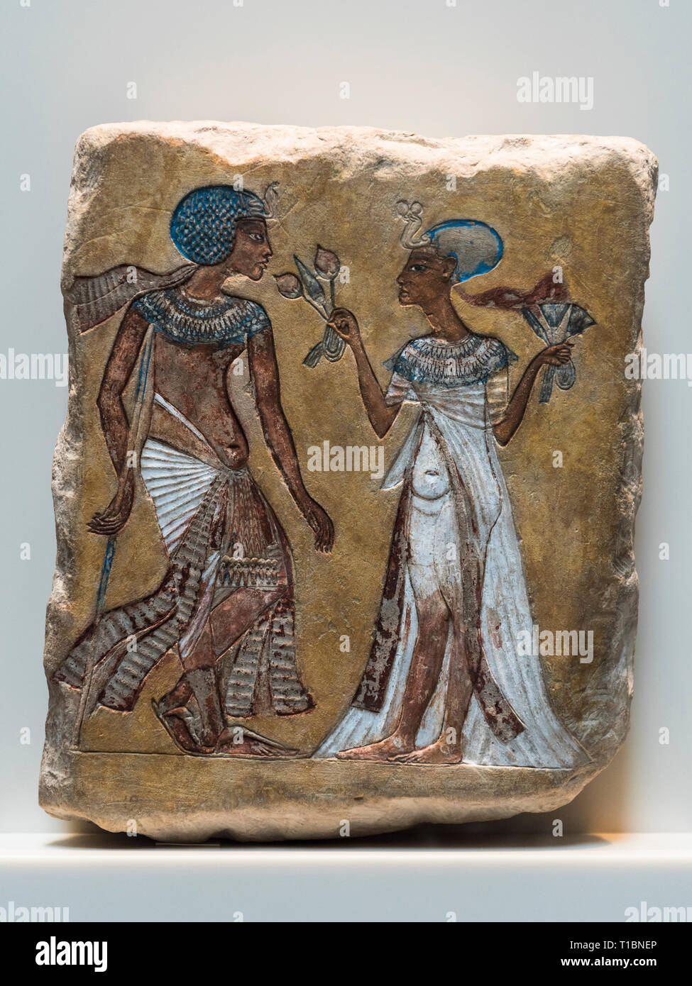 Berlin. Germany. Ancient Egyptian painted relief, Walk In The Garden, depicts a Pharaoh and a queen. New Kingdom Period, 18th Dynasty, ca. 1335 BC. Ne Stock Photo