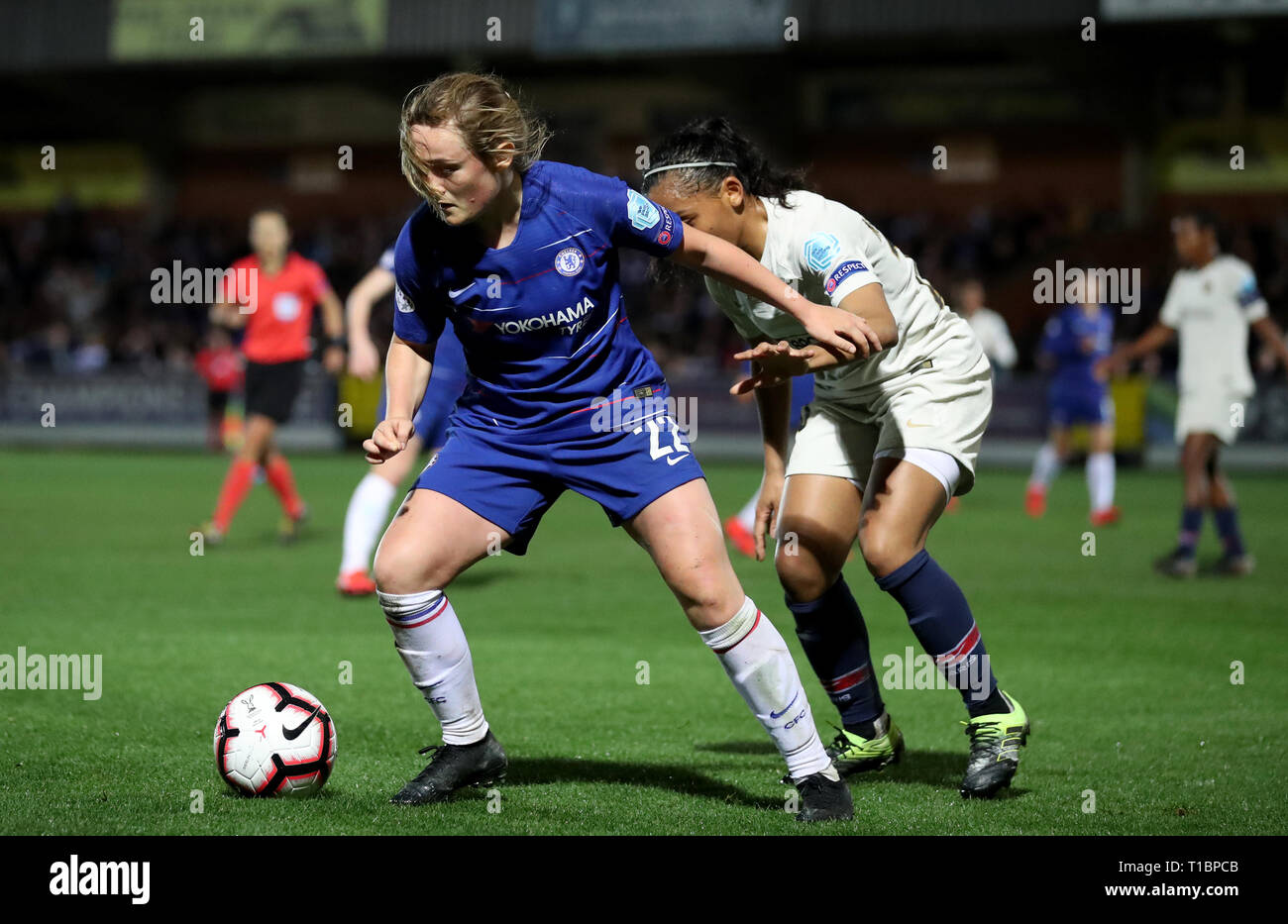 Chelsea Women's Erin Cuthbert in action with Paris Saint-Germain Women's Perle Morroni during the UEFA Women's Champions League quarter final first leg match at the Cherry Red Records Stadium, London. Stock Photo