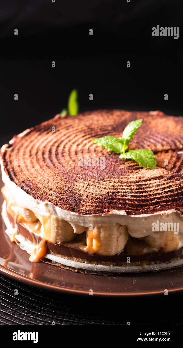 Food dessert concept homemade banoffee pie on black background Stock Photo