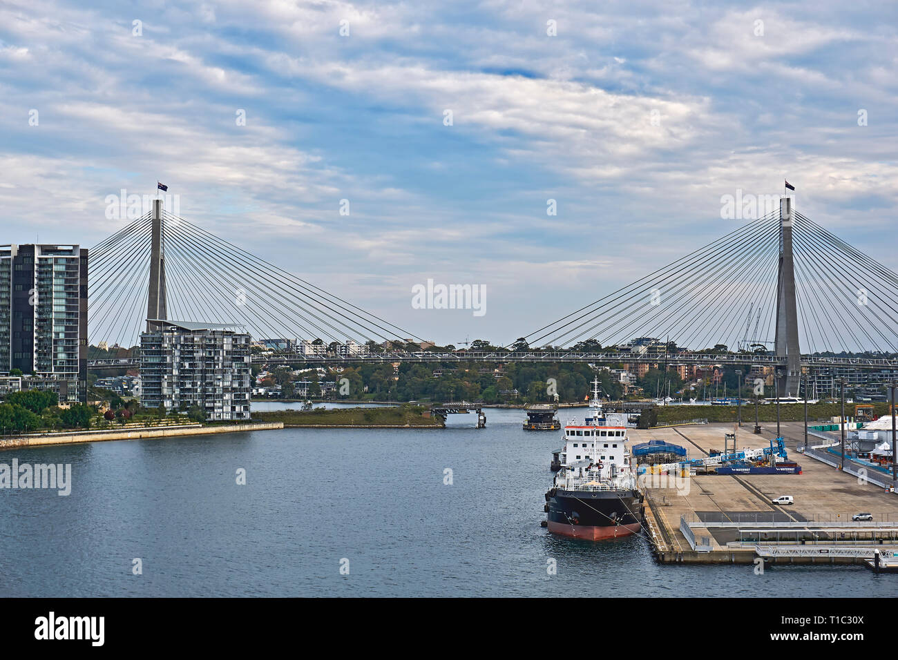 The Anzac Bridge is an 8-lane cable-stayed bridge spanning Johnstons Bay between Pyrmont and Glebe Island (part of the suburb of Rozelle), close to th Stock Photo