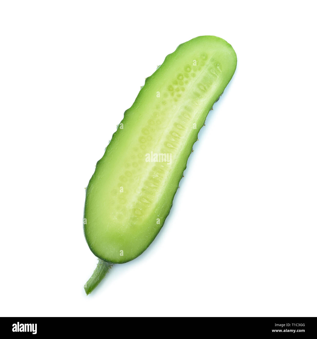 One slice of fresh cucumber isolated on white background Stock Photo