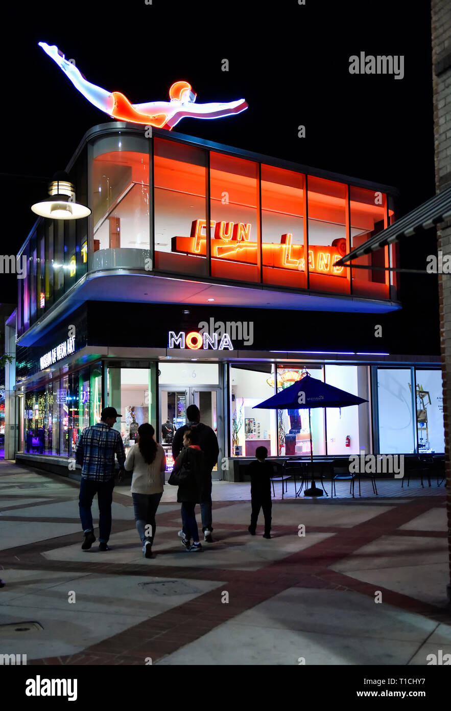 Exterior night scene of the Mona, The Museum of Neon Art storefront in Glendale, California Stock Photo