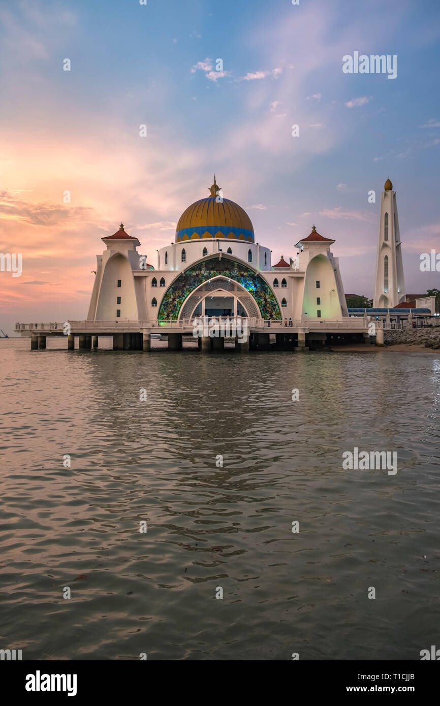 Sunset Over Melaka Straits Mosque Located In Malaysia And Built Using The Mix Of Middle Eastern And Malay Craftsmanship Looks Like A Floating Struc Stock Photo Alamy
