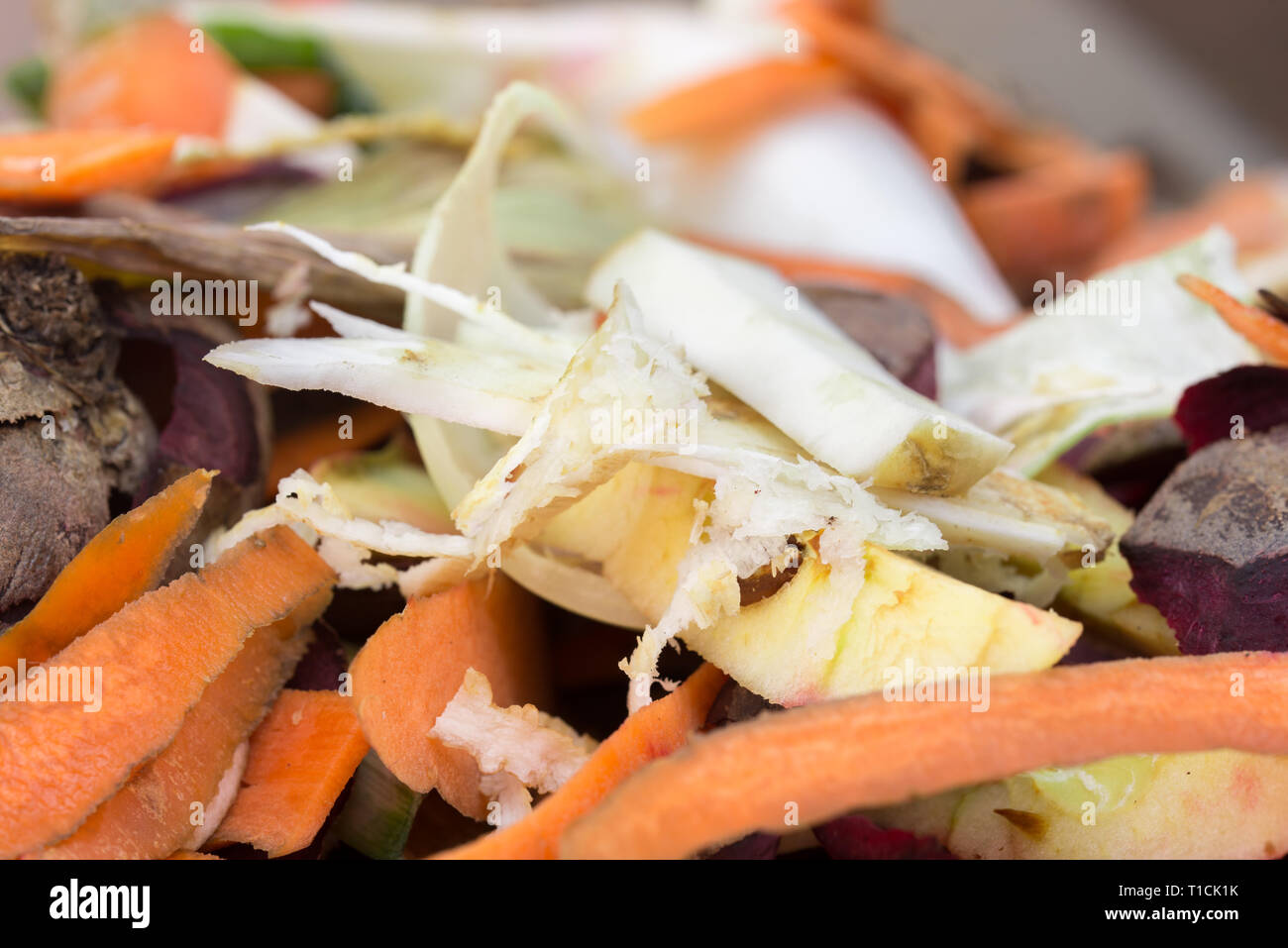 rotting kitchen vegetable scraps for composting Stock Photo