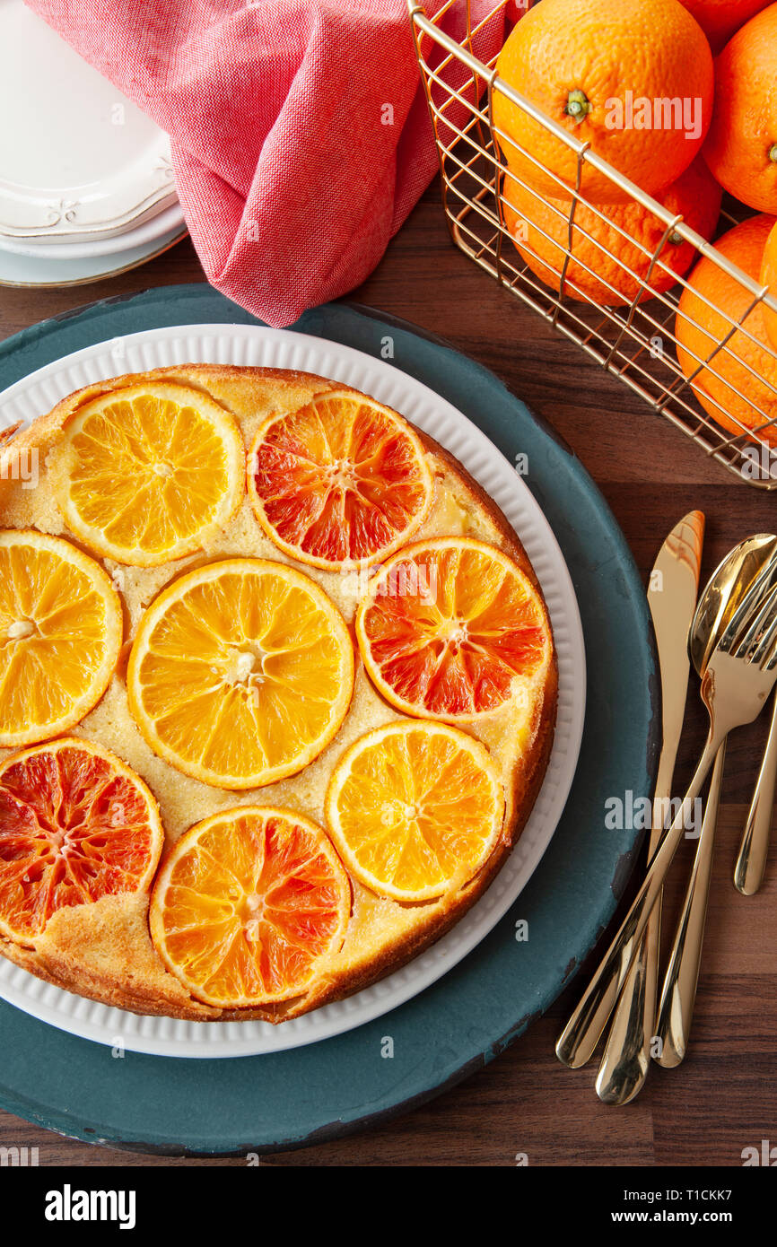 Fruity sponge cake with fresh candied oranges Stock Photo Alamy